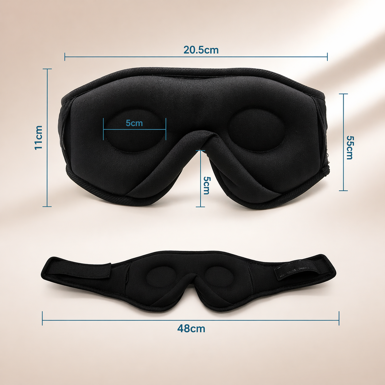 Black sleep mask with padded eye covers, adjustable strap, and dimensions of 20.5cm by 11cm for comfortable sleeping.